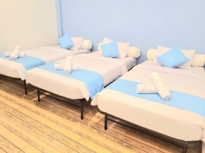 Zizi Homey Cemara Asri Triple Room 202